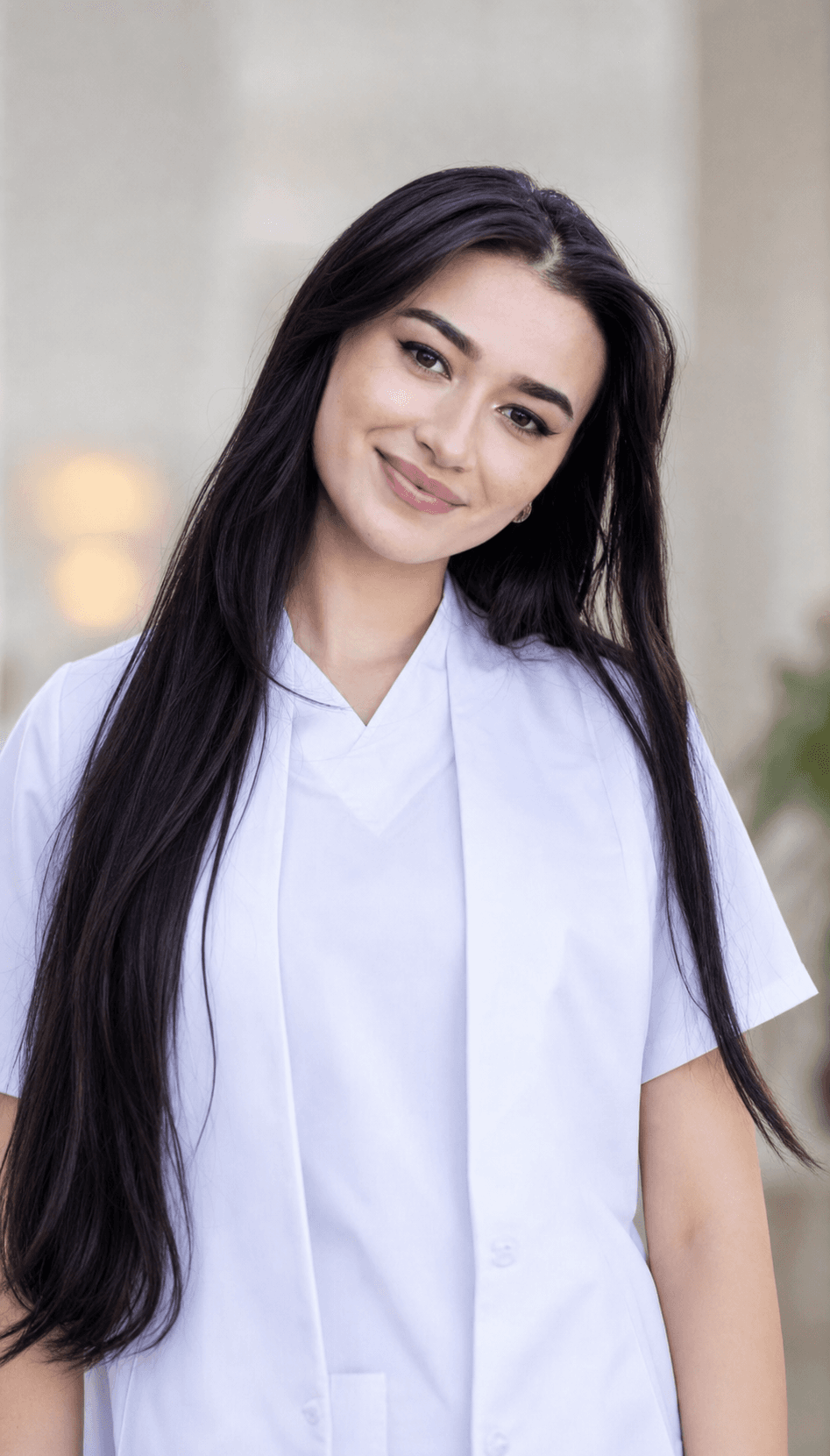 Portrait of Adna Raiz, Certified Nursing Assistant, in healthcare uniform